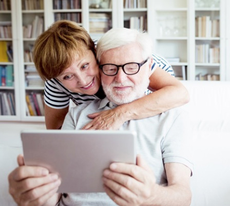 A couple using a tablet device