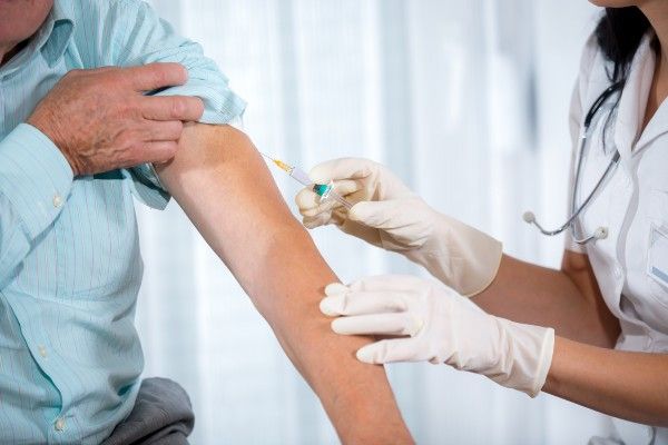 A patient being vaccinated